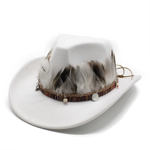 Detail of white felt cowboy hat with ethnic beads and natural feather band decoration