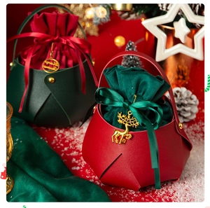 Detail of Christmas apple gift bag with faux leather shell and velvet drawstring lining