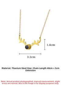 Close-up of gold titanium deer horn pendant with blue projection stone and dimensions