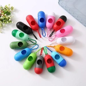 Capsule pet waste bag dispensers in 15 vibrant colors with hooks on white background