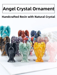 Detailed view of handmade resin angel figurines with colorful natural crystal stones