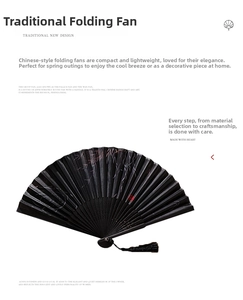 Detailed view of a black Chinese folding fan with bamboo pattern and tassel