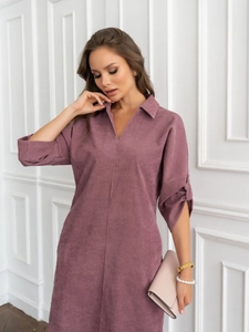Detailed close-up of mauve corduroy fabric texture and collar design on a midi dress