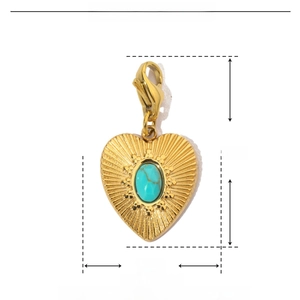 Macro view of gold heart pendant with blue natural stone and detailed size measurements