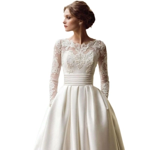 Elegant white satin wedding dress with long lace sleeves and a classic A-line silhouette