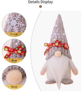 Detail of Christmas gnome showing snowflake patterns, bow tie and heart tag accessories