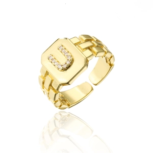 Detail of 18K gold plated adjustable ring featuring letter U with AAA zircon stones