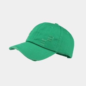 Detail view of washed distressed baseball cap featuring vintage ripped effects in neon green