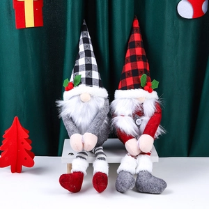 Christmas gnome plush curtain tiebacks with plaid hats on a white bench