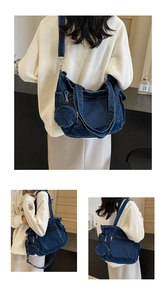 Three-way view of a large denim tote bag with a small round coin purse accessory