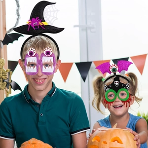Kids wearing Halloween headband and glasses set with pumpkin and bat party decorations