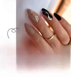 Detail of almond-shaped press-on nails with nude, black, and gold foil marble texture