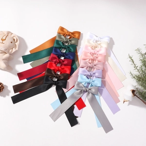 Colorful long ribbon satin bow hair clips in various macaron shades for kids