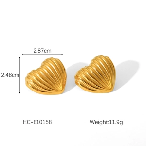 Detailed view of 18K gold textured heart earrings showing dimensions 2.87cm by 2.48cm