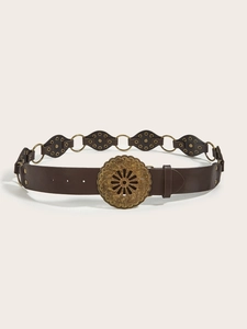 Retro millennial dark brown leather belt with large bronze rings and metal rivets
