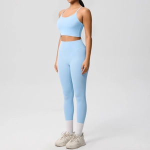 Light blue high-stretch yoga set with thin straps sports bra and high-waist leggings
