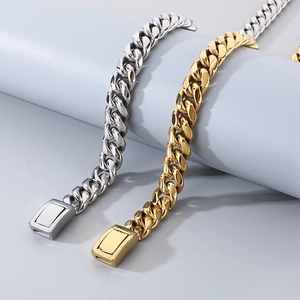 Minimalist 12mm Miami Cuban link bracelets in gold and silver steel on grey display