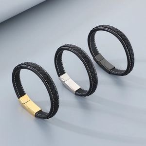 Detail of leather bracelets with gold, silver and black magnetic steel buckles