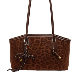 Large vintage leopard print tote bag with brown leather trim and shoulder strap
