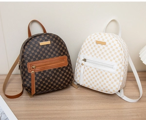 Mini floral printed backpacks in dark coffee and white colors with front zipper pockets