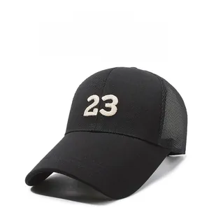 Close-up of baseball cap with white 23 embroidery and breathable mesh back