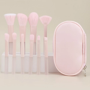 Set di 10 pennelli per trucco rosa con custodia in pelle PU su sfondo beige chiaro