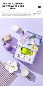 Ceramic coffee mug gift set with floral coaster and golden spoon in purple box