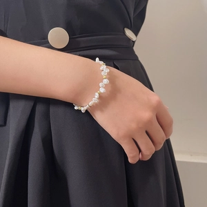 Baroque irregular pearl bracelet with gold beads on wrist, 925 sterling silver jewelry