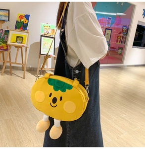 Cute yellow plush crossbody bag with cartoon character design and adjustable strap