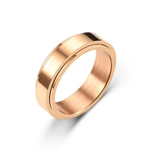 Minimalist spinning spinner ring in rose gold finish with polished beveled edges
