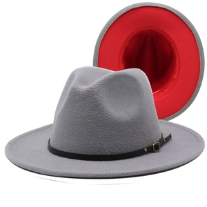 Detail of grey wool fedora with red underside, black leather belt, and metal buckle