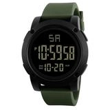 Digital sport watch detail with green silicone strap and black dial showing time and date
