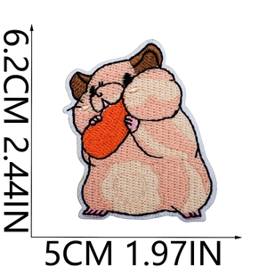 Close-up of hamster eating carrot embroidery patch with detailed size measurements