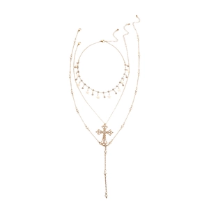 Three-layer gold necklace set featuring diamond cross and star fringe pendant charms