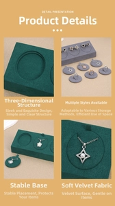 Detail of luxury green velvet jewelry display stands for rings and earrings