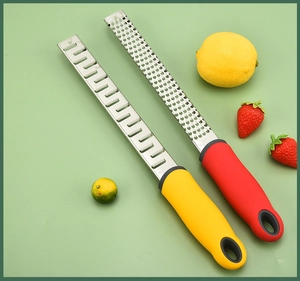 Kitchen cheese and lemon zester with stainless steel blades and colorful silicone handles