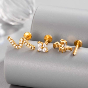 Golden stainless steel stud set with wave, flower, and butterfly shapes with clear zircon