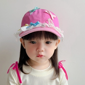 Pink kids baseball cap with lace trim, white pearls and colorful ribbon bows