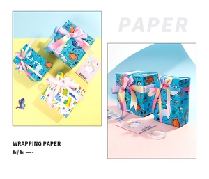 Detail of dinosaur birthday wrapping paper set with ribbons, cards and stickers