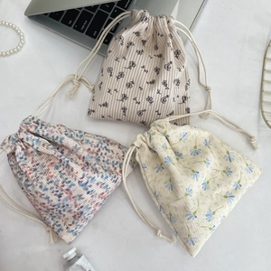 Floral corduroy drawstring cosmetic bag set for skincare storage and travel