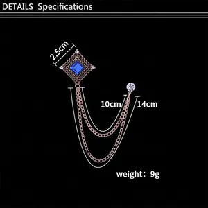 Retro square brooch for men with blue gemstone, hollow patterns and tassel chains