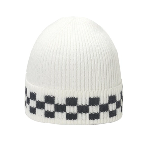 Winter rib-knit white beanie with black and white checkerboard pattern cuff detail