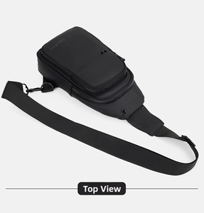 Top view of minimalist black crossbody chest bag featuring waterproof matte nylon fabric