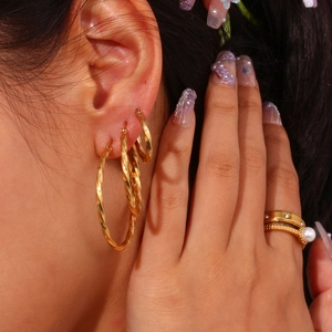 Gold twisted rope hoop earrings and matching pearl and diamond rings set for women