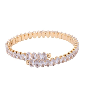 Luxurious gold-plated open bangle with oval-cut cubic zirconia in a minimalist style