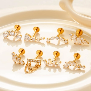 Set of 8 gold titanium F136 internally threaded heart studs with clear gemstones