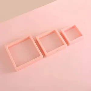 Three-piece pink PE film suspension jewelry display boxes in various sizes