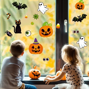 Cute Halloween window stickers with pumpkins and ghosts on glass with children