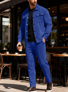 Close-up of royal blue suede two-piece set featuring shirt jacket and matching pants