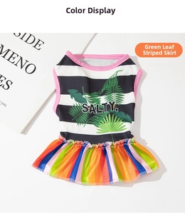 Detail of cute striped pet dress with palm leaf print and colorful pleated skirt